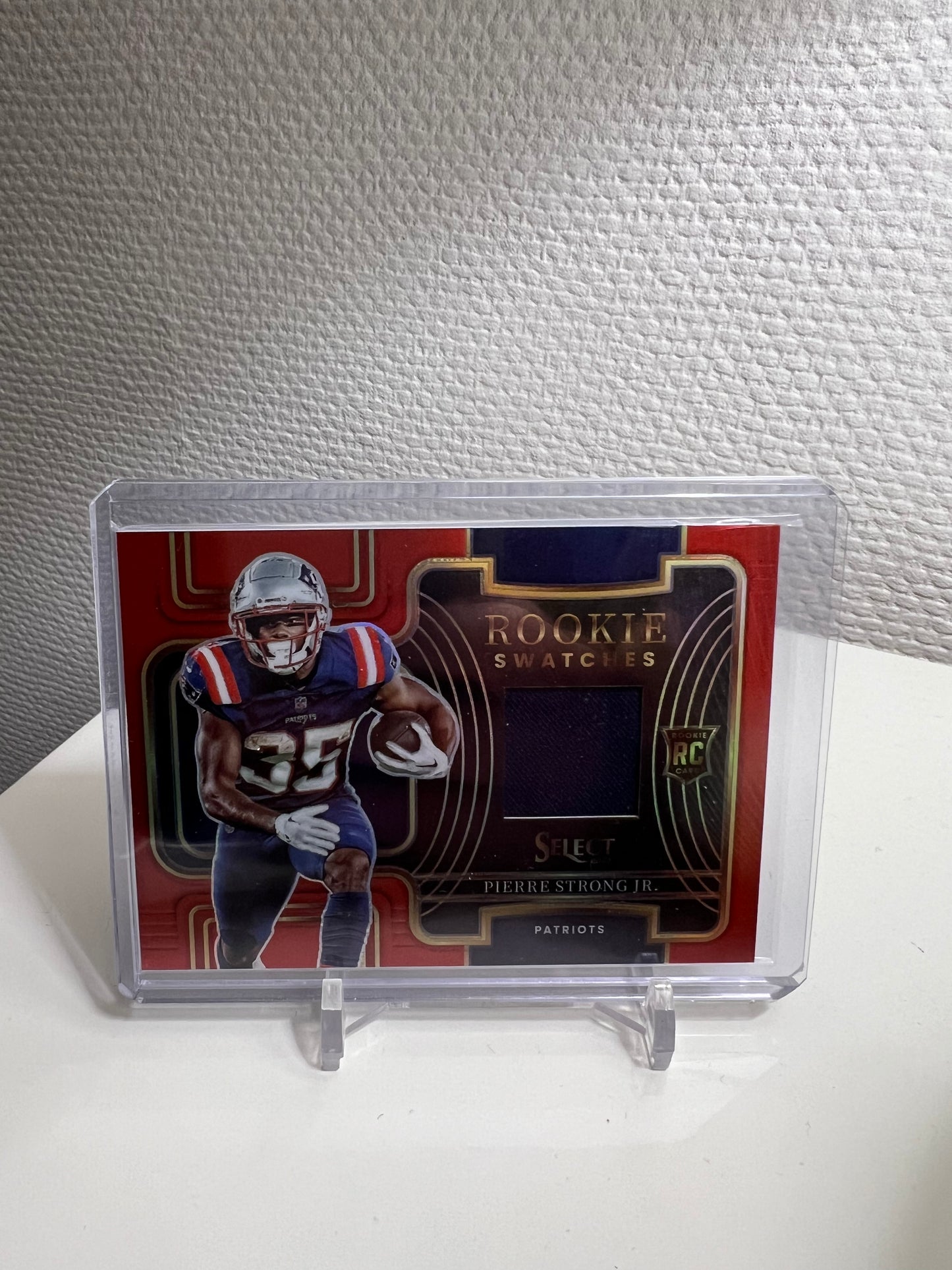 Select 22 - Pierre Strong Jr. Rookie Swatches RC Card Red Prizm - New England Patriots #RSW-24