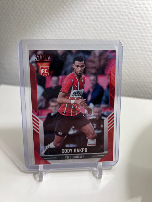 Score 21-22 - Cody Gakpo Red Lava RC Card - PSV Eindhoven